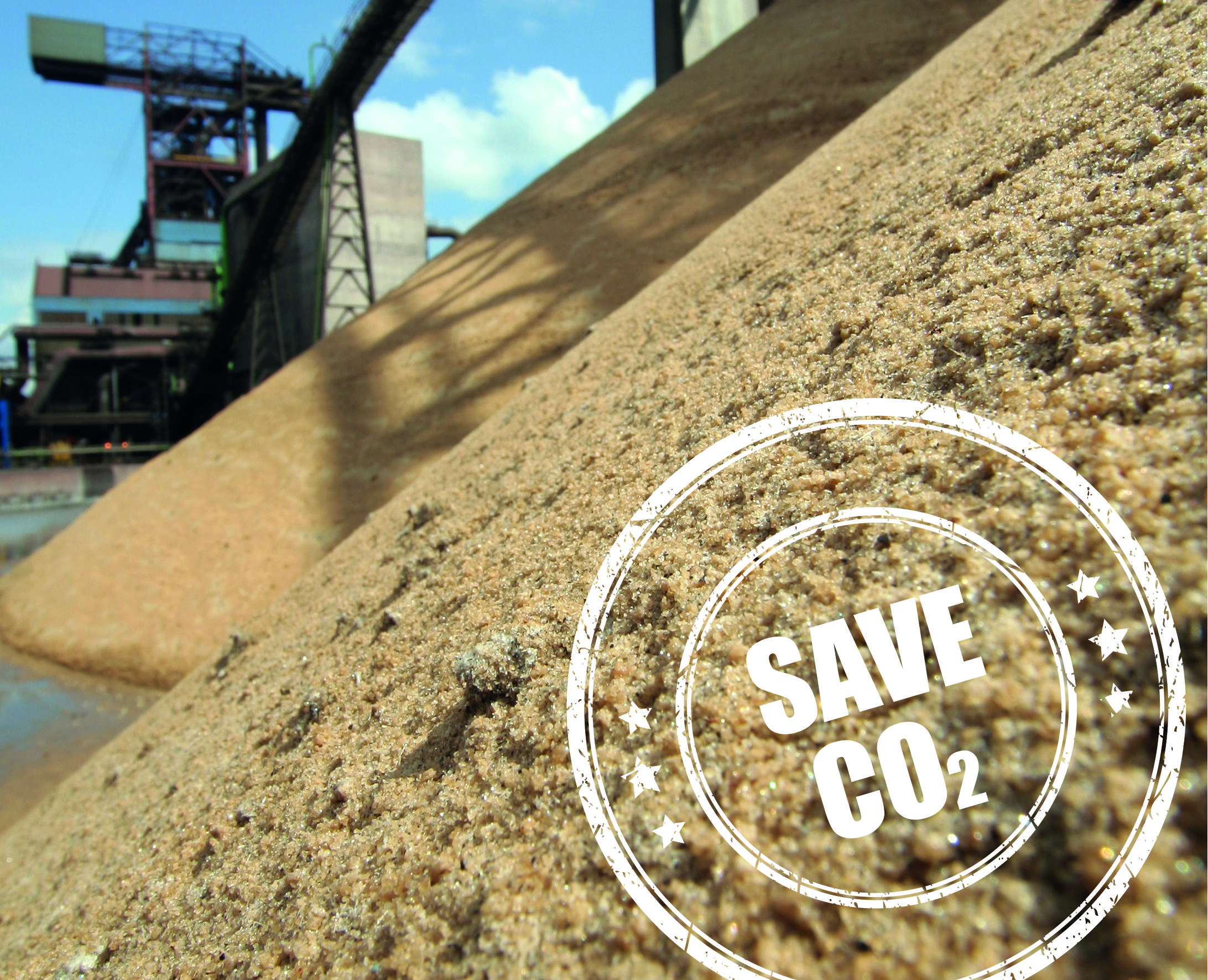 Picture of a sand mountain with a stamp on it that says SAVE CO2