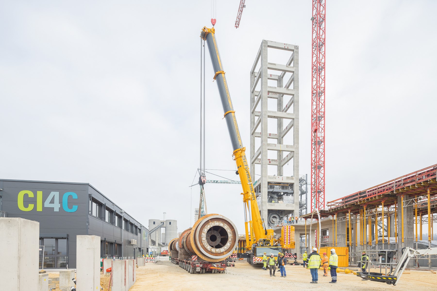 Horizontal rotary kiln is attached to a crane