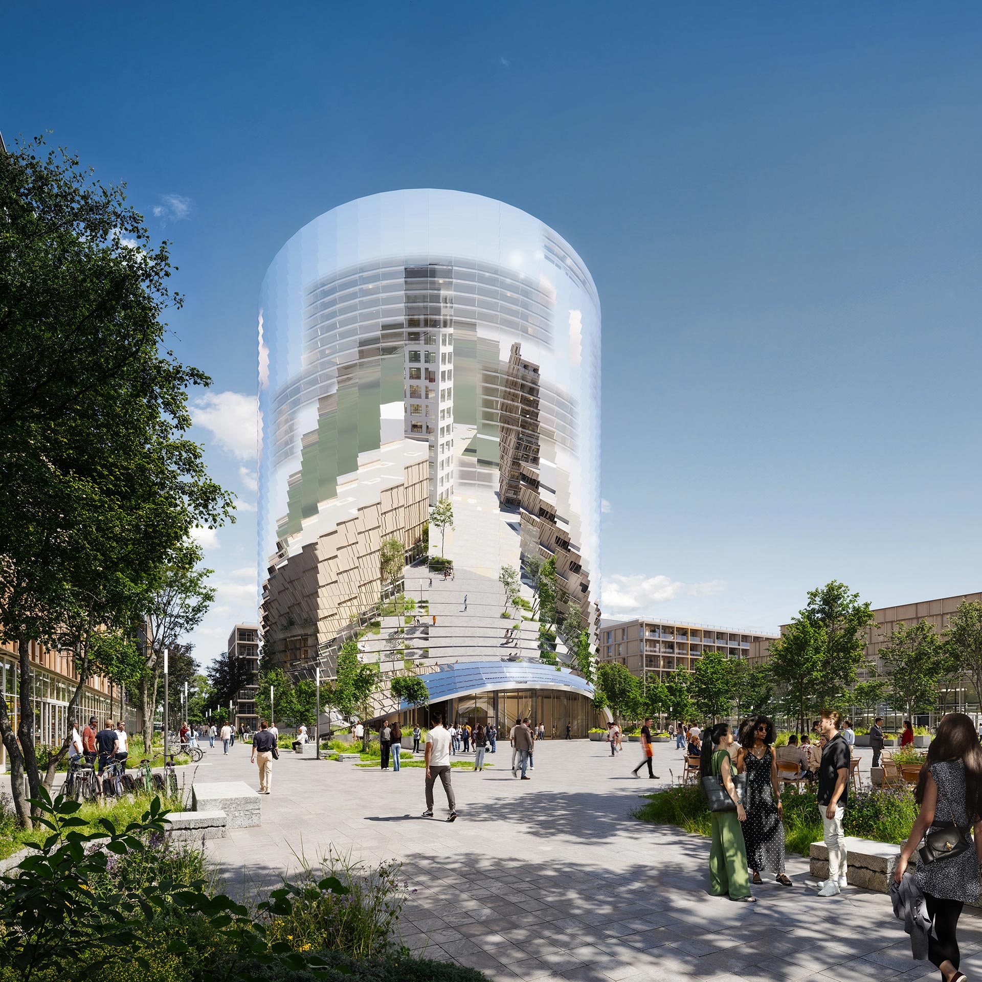 Modern cylindrical building with a reflective glass facade surrounded by greenery and pedestrian pathways. 