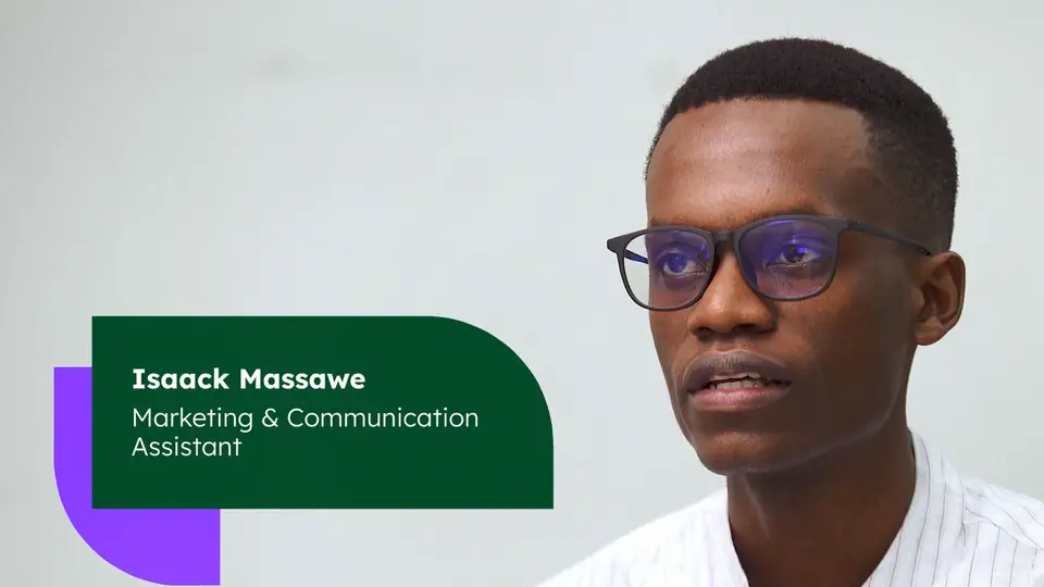 Close-up of a young man with short black hair and glasses