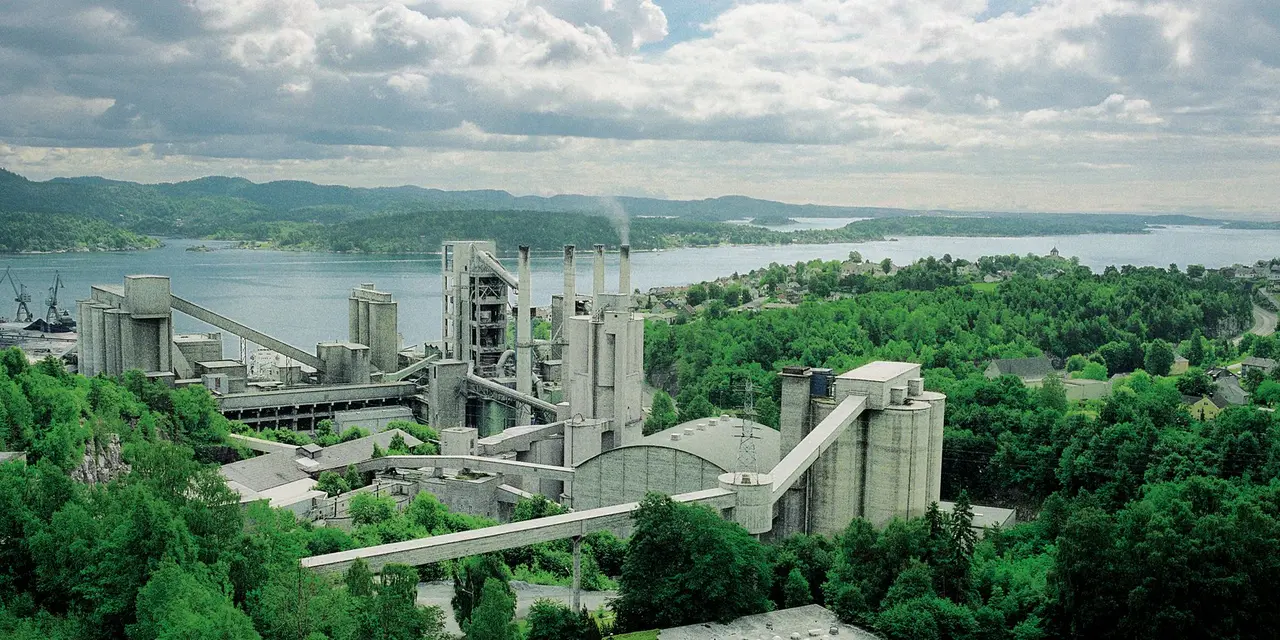 A cement plant surrounded by woodlands and lakes