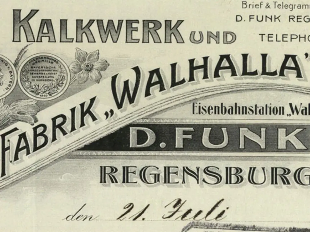 Historische Darstellung einer Zementfabrik mit der Aufschrift „Kalkwerk und Portlandcement-Fabrik Walhalla“.