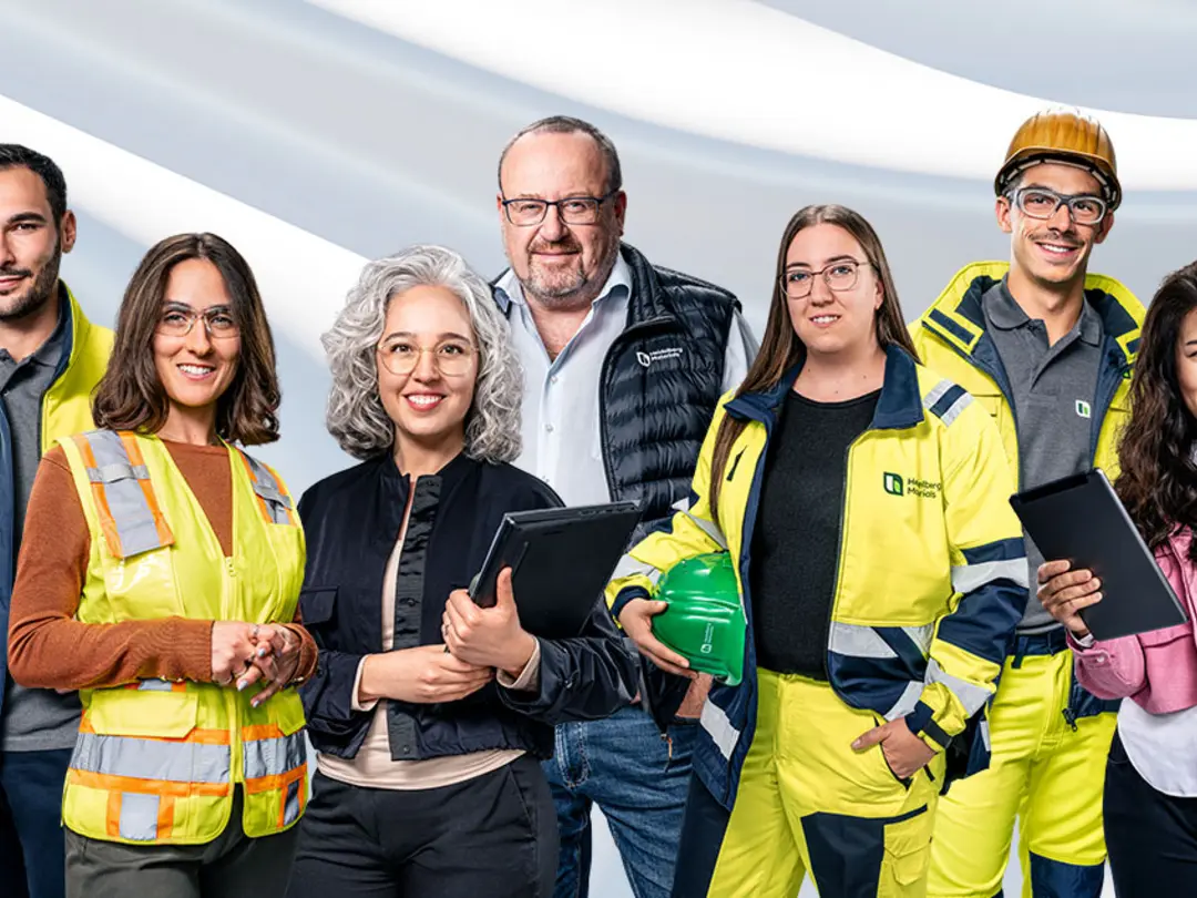 Employees of Heidelberg Materials from all areas of the company, both with and without protective clothing