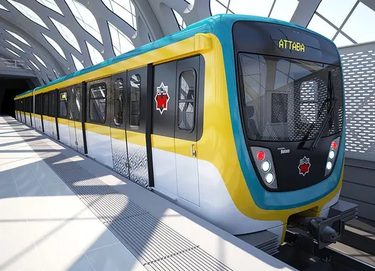 A modern train parked inside a bright, sleek station tunnel.